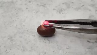 EXPERIMENT Glowing 1000 Degree METAL BALL vs Crayons