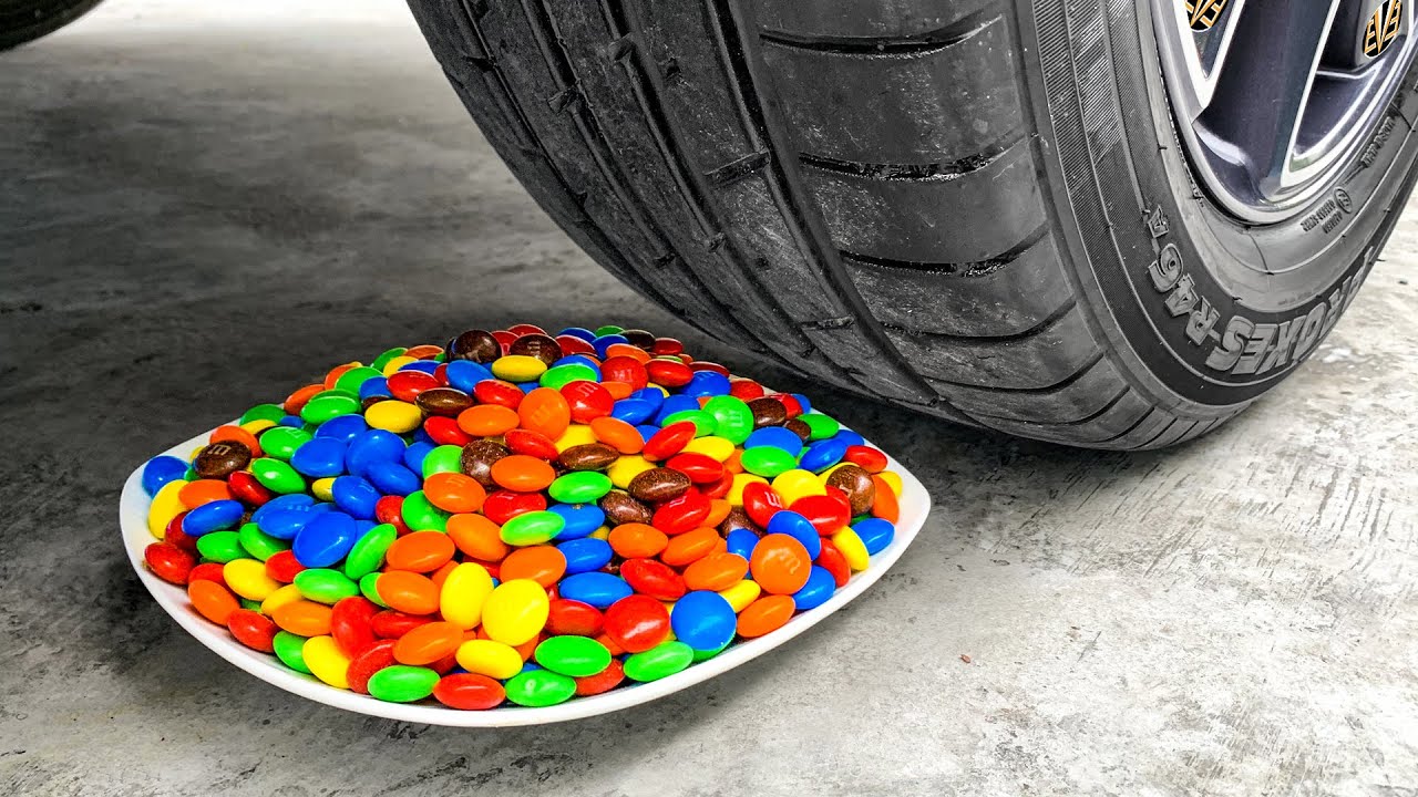 Crush toy car. M&M'S vs skittles. Crushing crunchy & Soft things by car! - Experiment: Halloween Pumpkins vs car vs food.