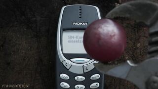 NOKIA 3310 VS RED HOT STEEL BALL! Will It Survive?