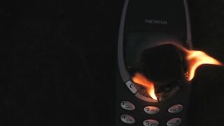 NOKIA 3310 VS HOT SHISHA COAL! Will It Survive?