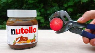 EXPERIMENT: Glowing 1000 Degree METAL BALL vs NUTELLA