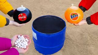 Balloons with Coca Cola and Fanta vs Mentos in a Barrel !