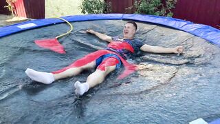 EXPERIMENT MAN under GIANT WATER BALLOON