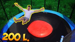JUMPING ON A 200-LITER GIANT WATER BALLOON LAYING ON A TRAMPOLINE