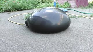 CAN ONE BURN A HUGE WATER BALLOON WITH A POWERFUL LASER?!?