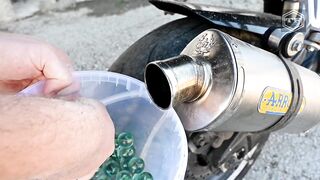 EXPERIMENT 100 BIG MARBLES  in MOTORCYCLE EXHAUST