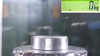 How Strong is Titanium? Hydraulic Press Test!