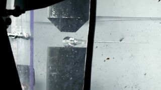 Making Light by Crushing Prince Rupert's Drops with Hydraulic Press