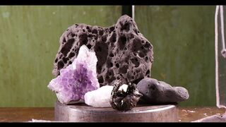 Crushing amethyst and lava stones with hydraulic press