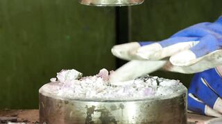 Crushing amethyst and lava stones with hydraulic press