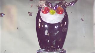 SUPER SLOW MOTION: Crushing art glass with hydraulic press
