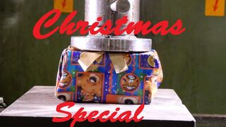 Crushing Christmas with hydraulic press