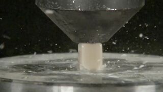 Crushing ceramic dental implants with hydraulic press