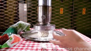 Making pizza with hydraulic press