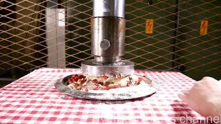 Making pizza with hydraulic press
