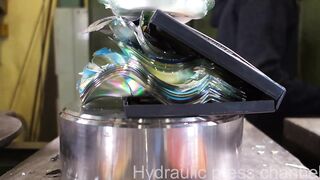 Crushing DVDs for dudesons with hydraulic press