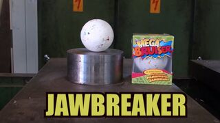 Crushing Jawbreaker with hydraulic press