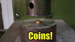 Crushing coins with hydraulic press