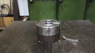 Crushing watch with hydraulic press