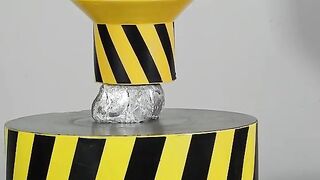 100 TON HYDRAULIC PRESS PRESSES THE FOIL TO A SINGLE PIECE OF ALUMINUM