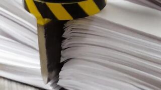 100 TONS PRESS VS 1000 SHEETS OF PAPER